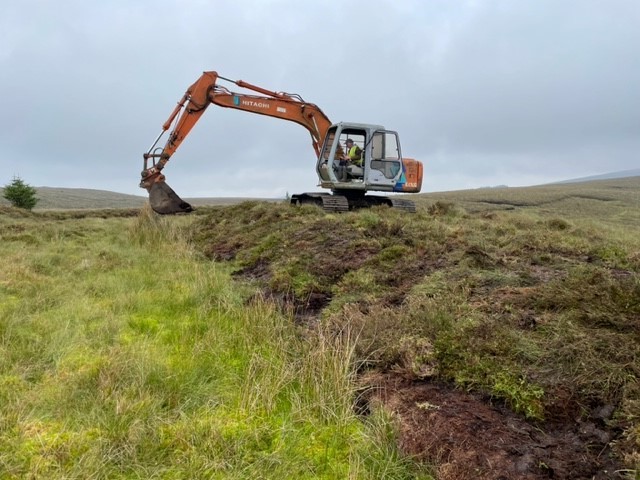 Tractor Performing Bog Restoration